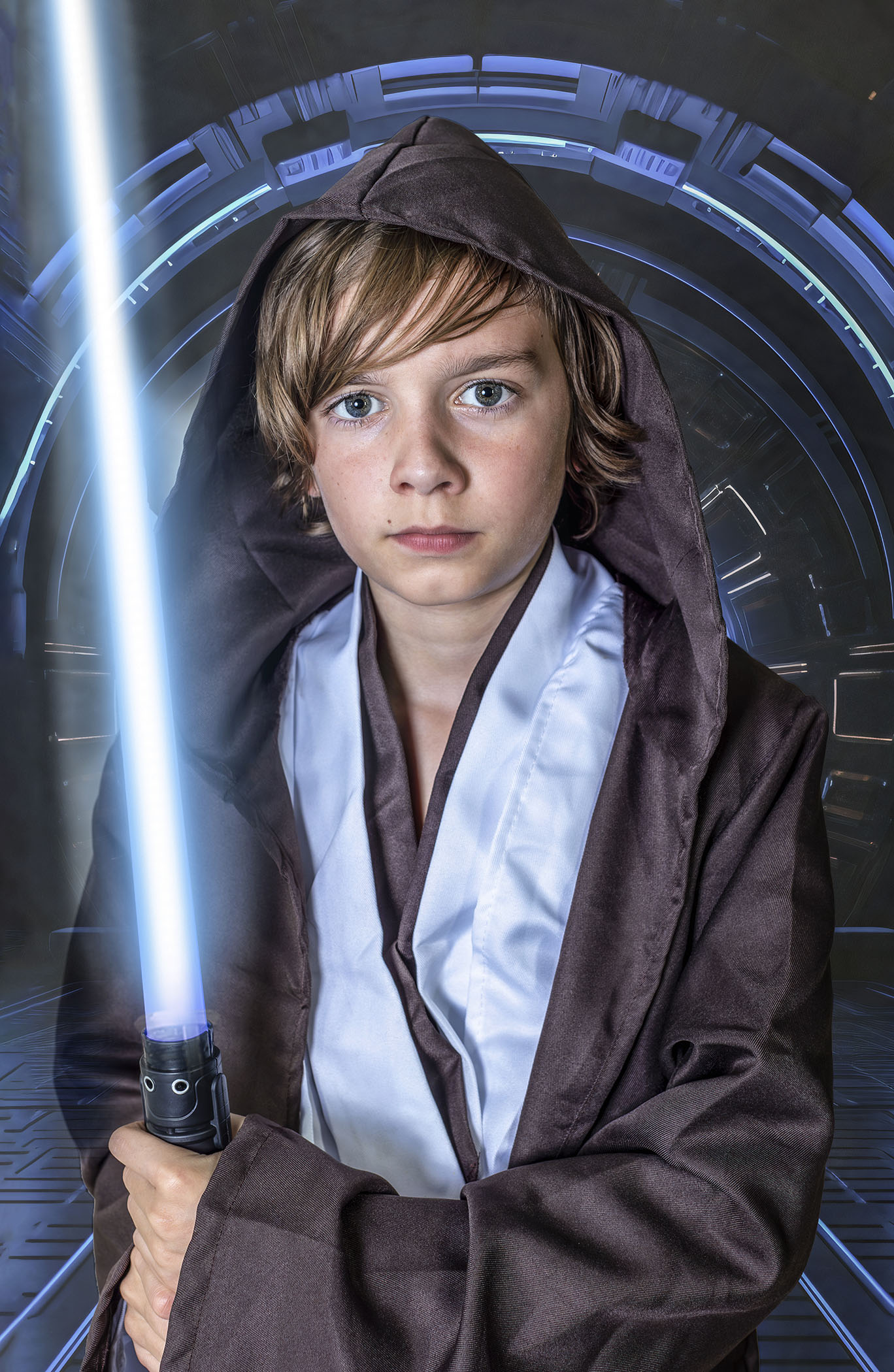 Boy in a jedi costume
